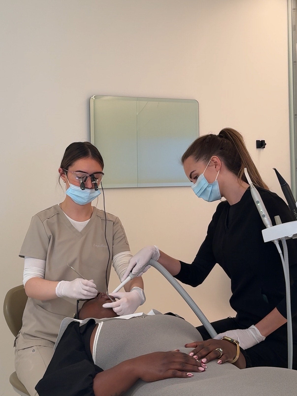 Freya Milnes Dental Therapist and Happythreads content creator wearing khaki scrubs