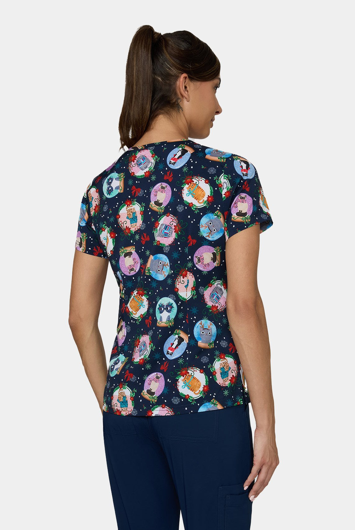 Back view of Koi Basics Leslie scrub top – Holiday Cats print