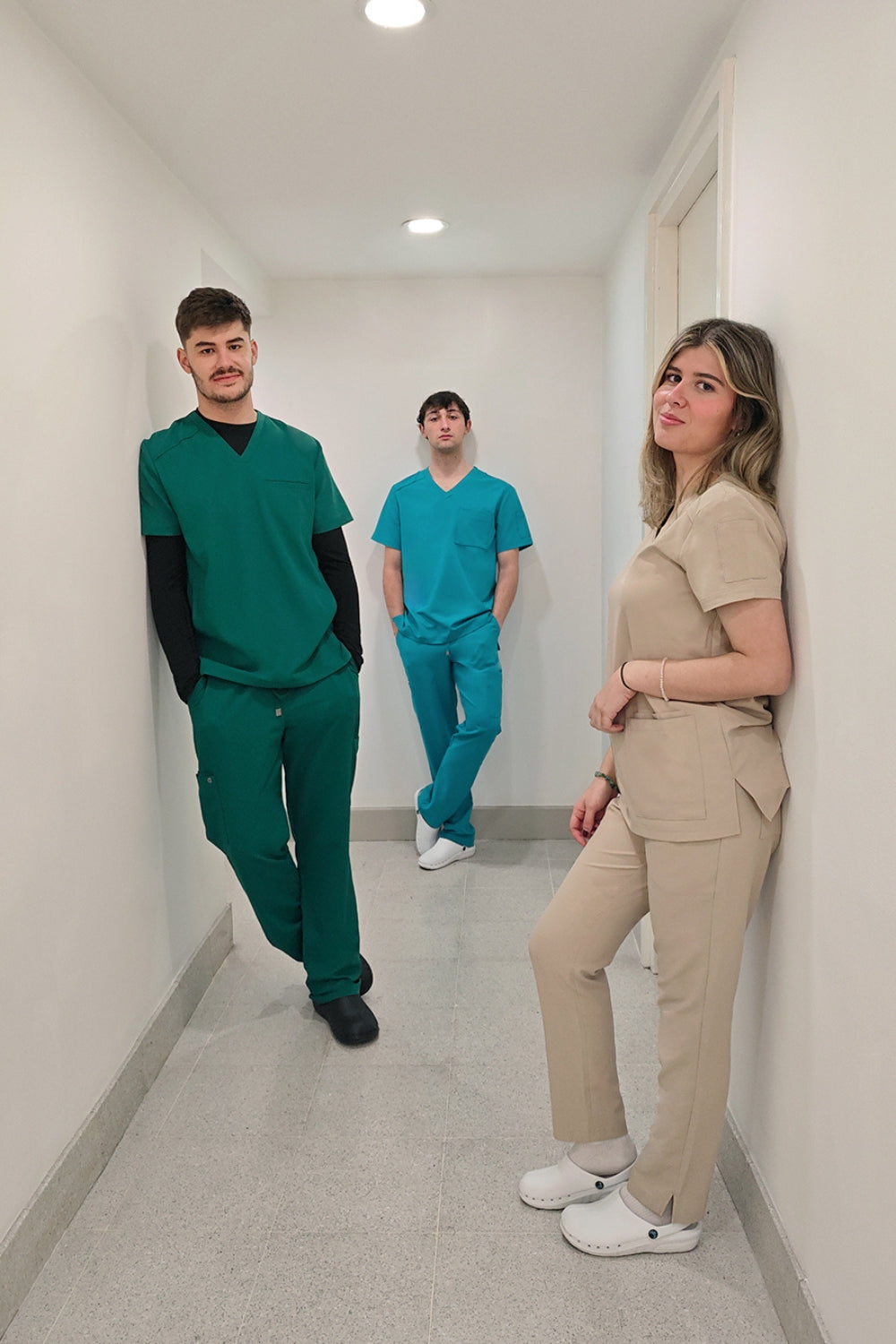 Group of laboratory technicians wearing professional medical scrubs