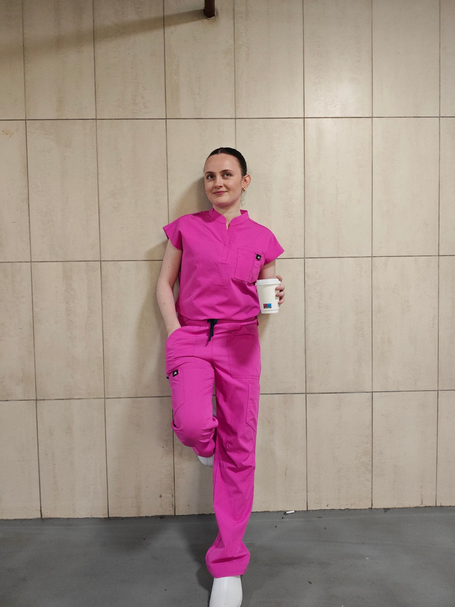 Comfortable podiatry scrubs designed for podiatrists performing foot care treatments