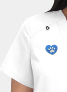 Hustle and Heart white embroidery close-up