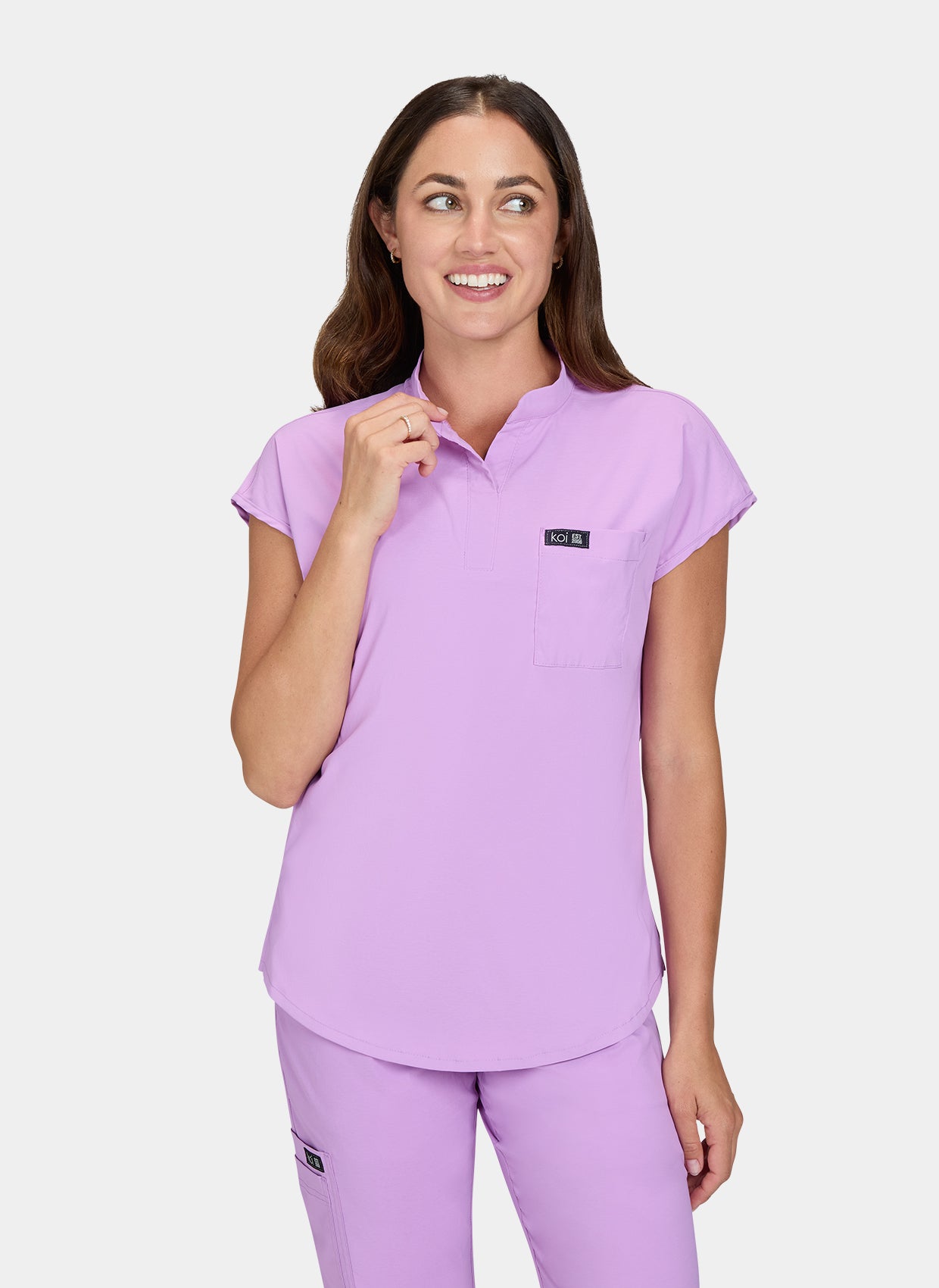 Koi basics Ari Scrub Top Bloom Lavender hand pose