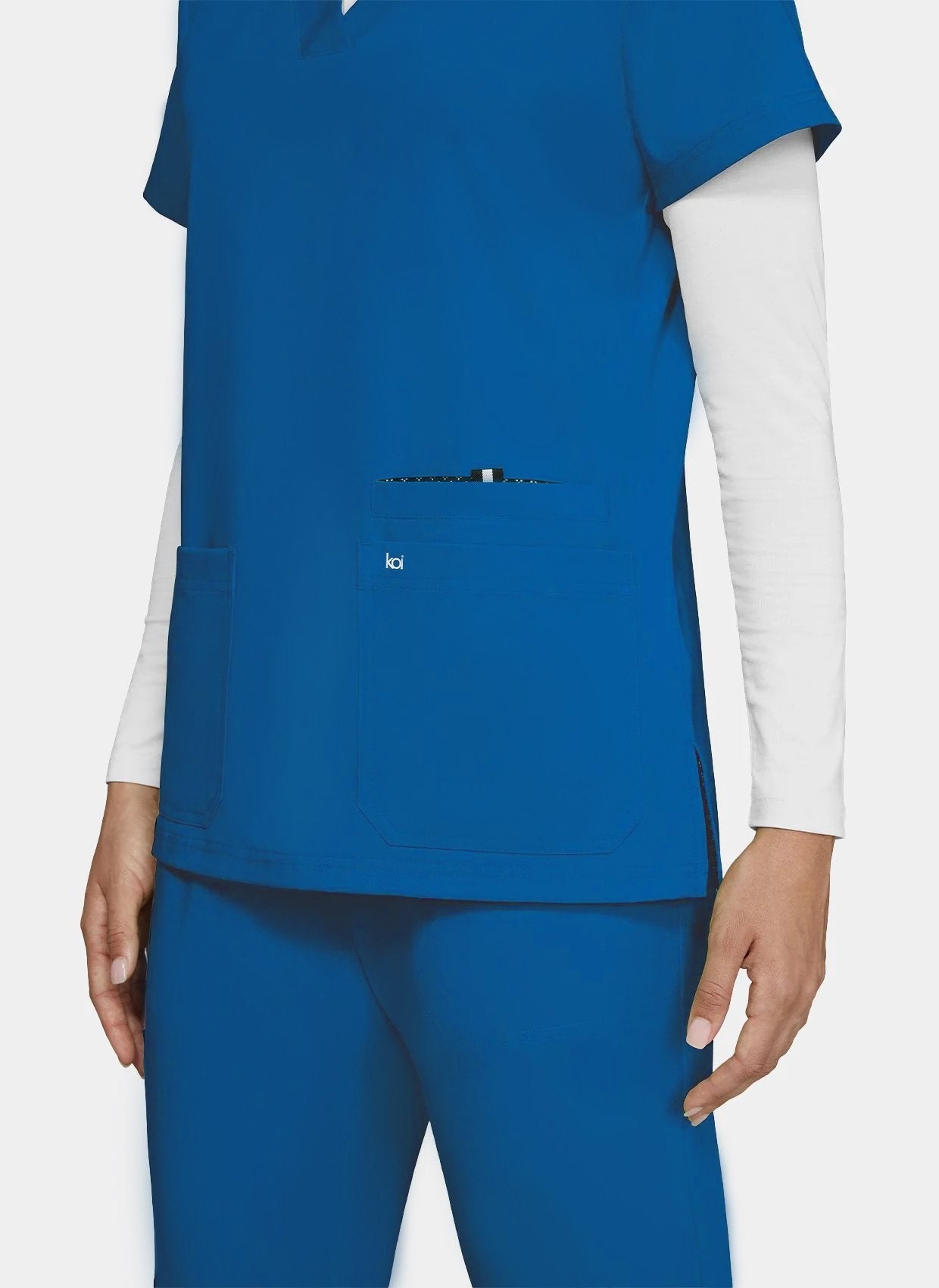 womens-koi-next-gen-hustle-and-heart-scrub-top-royal-1